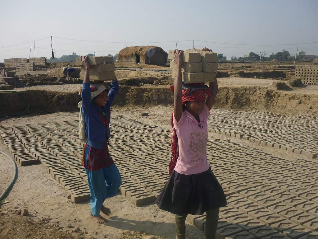 Up to 1.7million children from the age of five are working in illegal brick factories in Pakistan . They work up to 14 hours a day with little food, no sanitation and little pay